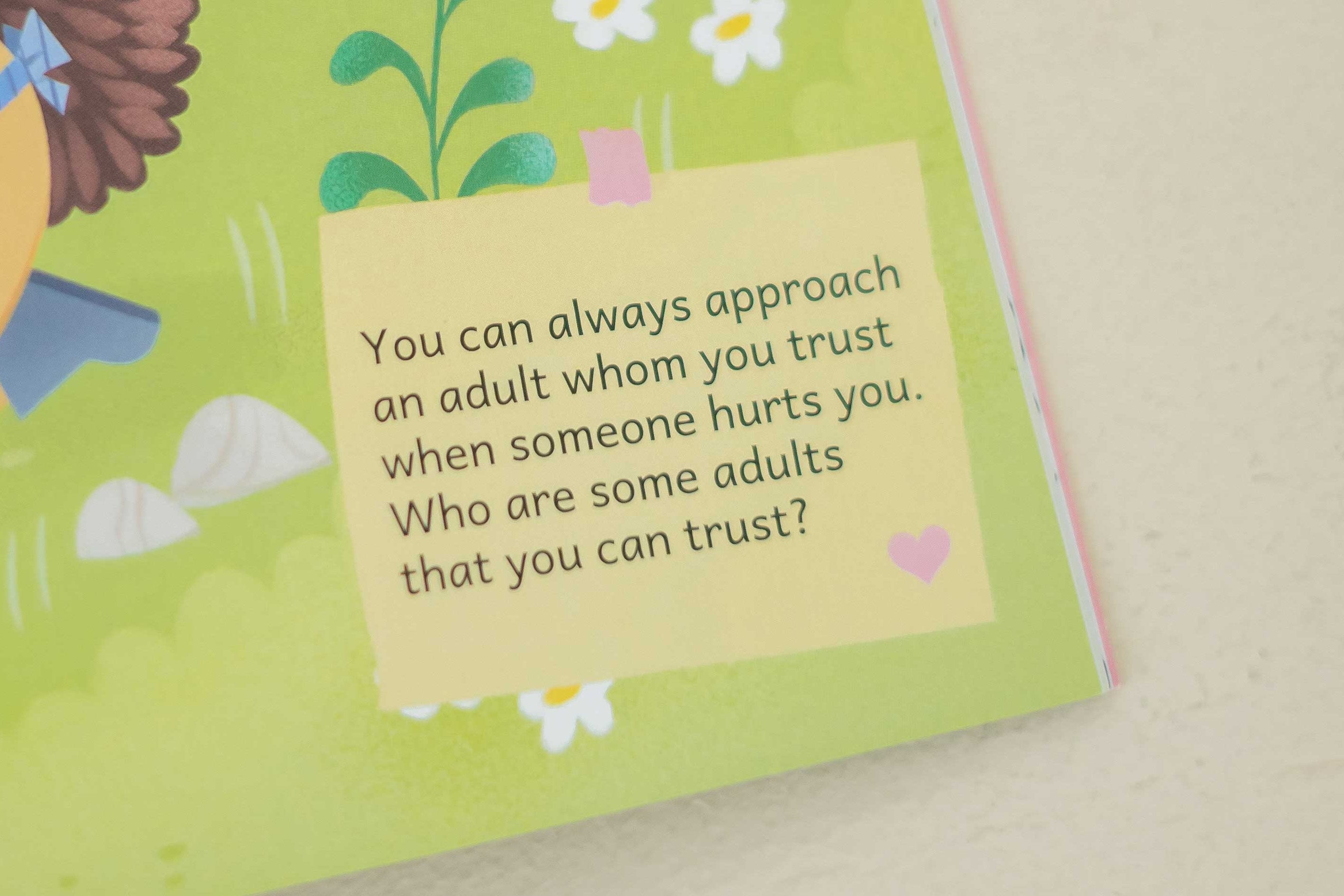 Children's book page with a hedgehog illustration and text on a light background